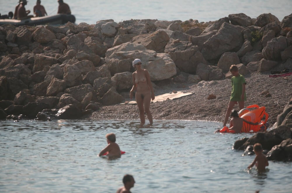 FKK cove pyramid in waters - The equality of naked human bodies helps us accept ourselves and others