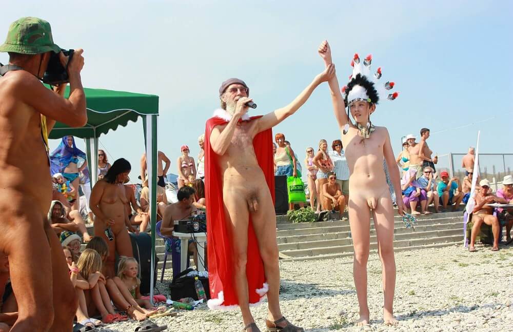 Native Headdress Dance pics - Only a nudist truly values the connection with nature and the human body
