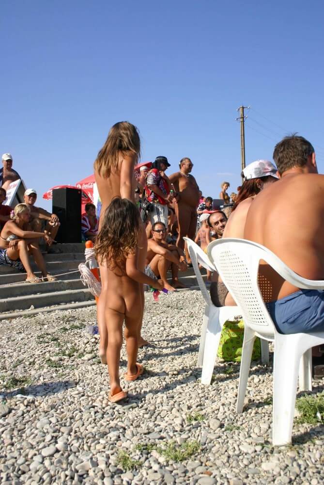 Naturist Standing Sideline - Nudism promotes inner happiness