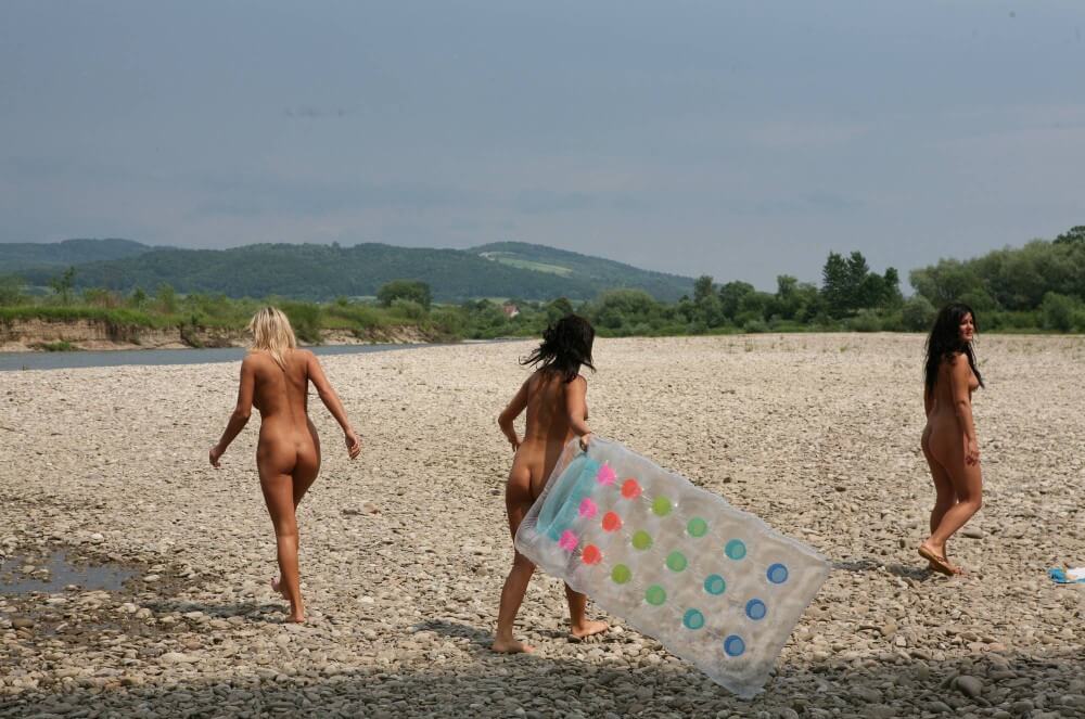 Naturist Park Floating On River photos - Accepting oneself fully is the foundation of naturism and nudism