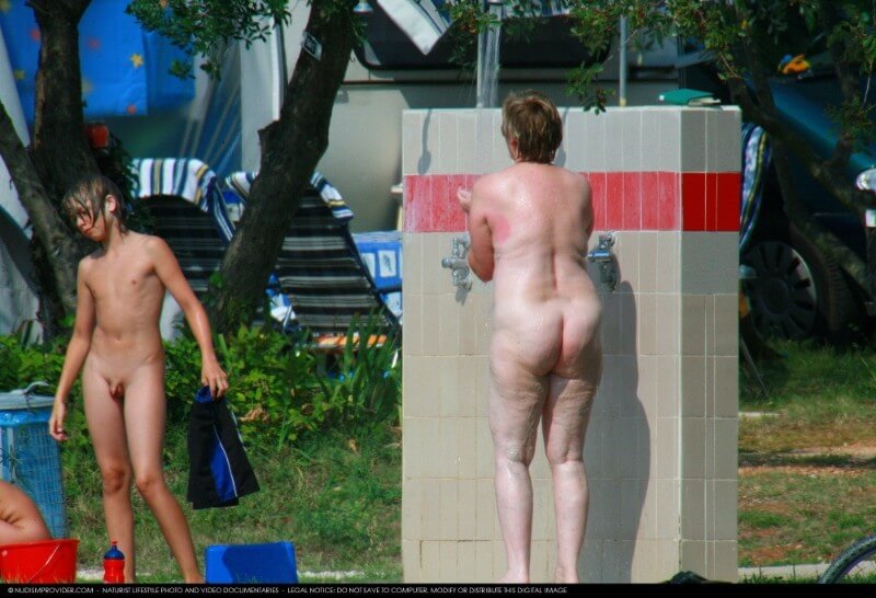 Covered in Towel Nudists-Boardwalk Biking - Nudism contributes to the strengthening of psychological health