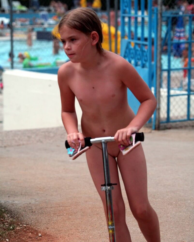 Pool-Side Naturist Scooter pics - Types of recreation in nudist and naturist resorts and parks