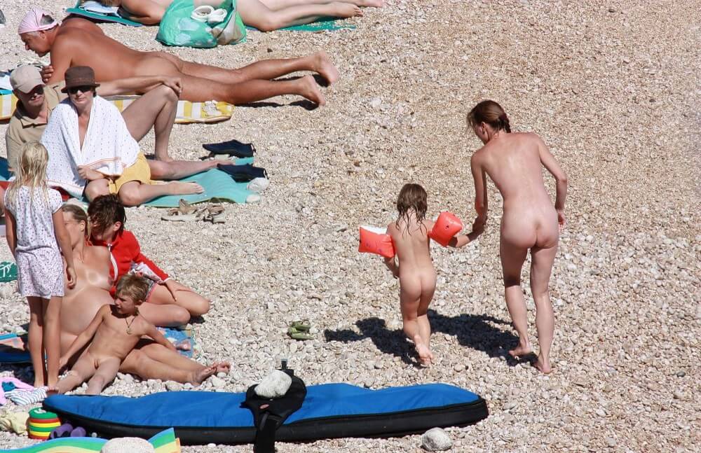 Orange Floaty Safety First Naturist pics - For those who want to officially become nudists